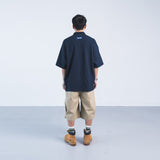 TEXTURED WAFFLE-KNIT SHORT-SLEEVE POLO