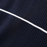 TEXTURED WAFFLE-KNIT SHORT-SLEEVE POLO