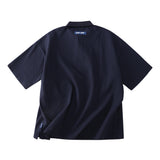 TEXTURED WAFFLE-KNIT SHORT-SLEEVE POLO